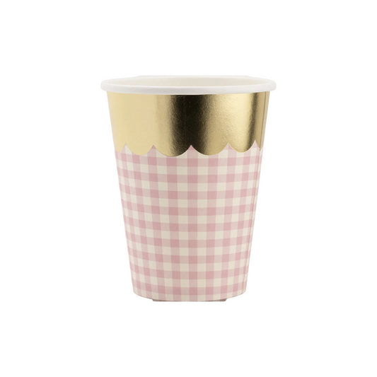 A single paper party cup with a pink and white gingham check pattern, a scalloped metallic gold band near the rim, and a white interior, shown on a plain white background.