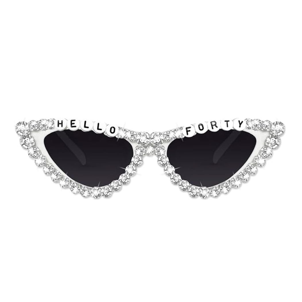 Pair of silver cat eye glasses with hello 40 on a white background