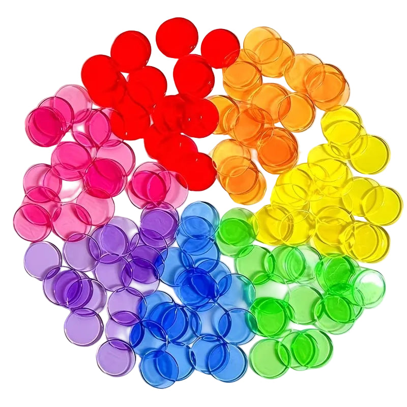 Colorful round transparent beads arranged in a rainbow pattern on a white background