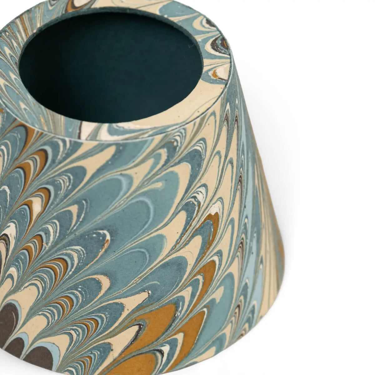 A conical lampshade featuring a marbled paper pattern with swirling teal, beige, and ochre brown waves, shown on a clean white background.