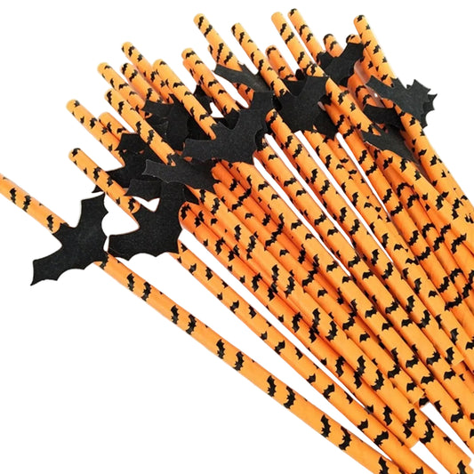 A set of orange paper party straws decorated with a repeating black bat pattern and topped with black bat cutouts, arranged on a plain white background.