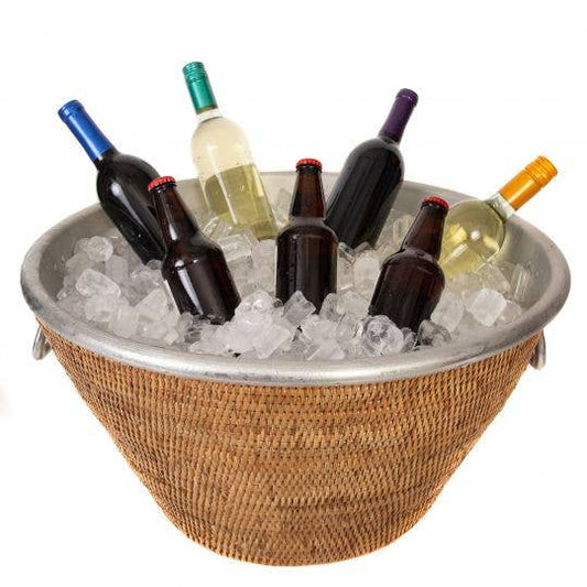 Wicker ice bucket with ice and wine bottles on a white background