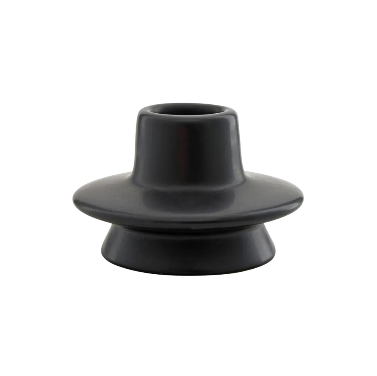 Black ceramic candlestick on a white background