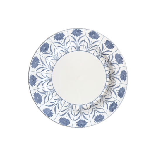 Decorative plate with blue floral pattern on a white background