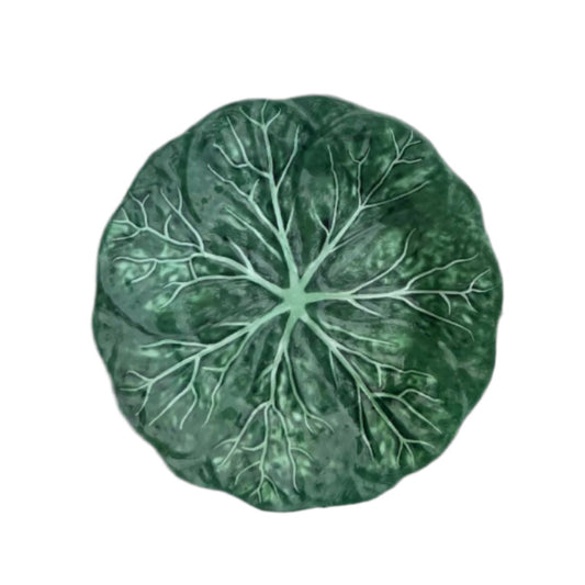 Green cabbage plate on a white background