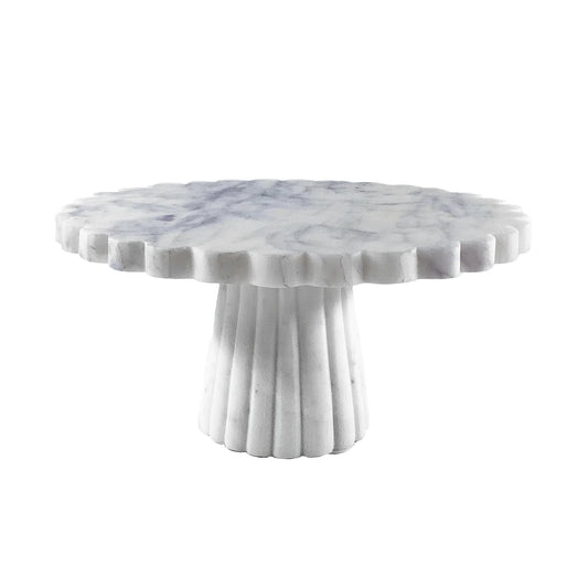 Marble-patterned round cake stand on a white background