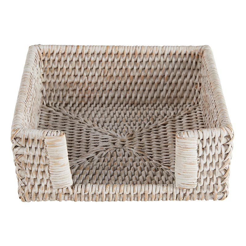 Woven rattan napkin holder on a white background