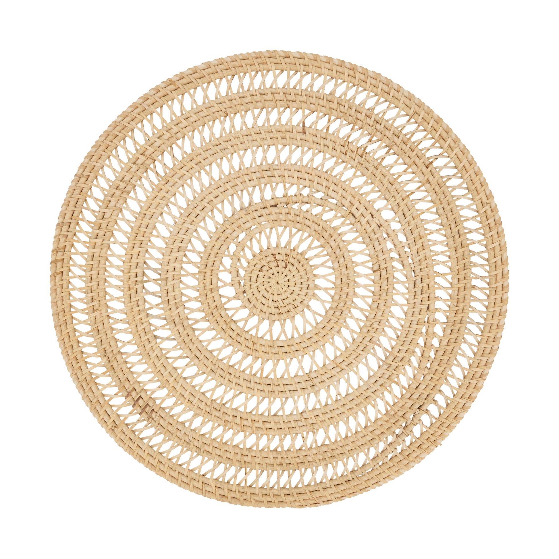 Round woven placemat with concentric circles on a white background