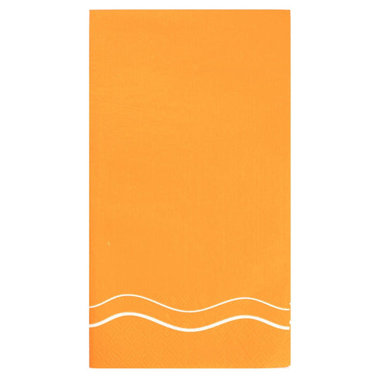 Orange guest towel with white wave design on a white background