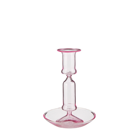 pink glass candle holder on a white background