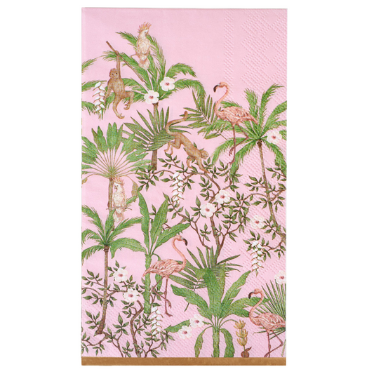Paper napkin with a tropical design featuring flamingos, monkeys, and palm trees on a pink background.