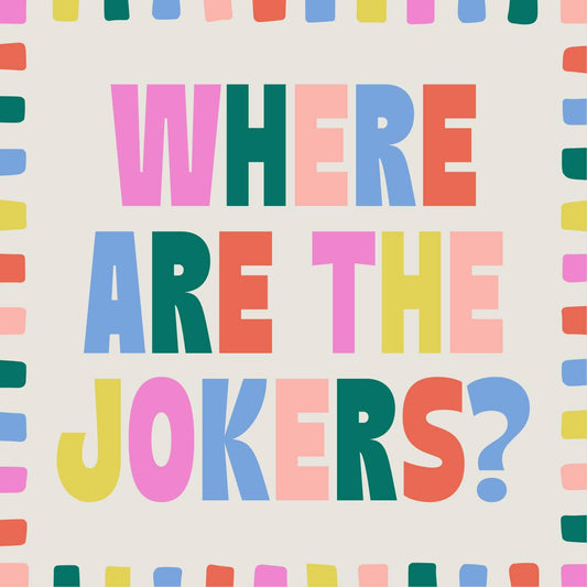 Colorful cocktail napkins with 'WHERE ARE THE JOKERS?' on a patterned background