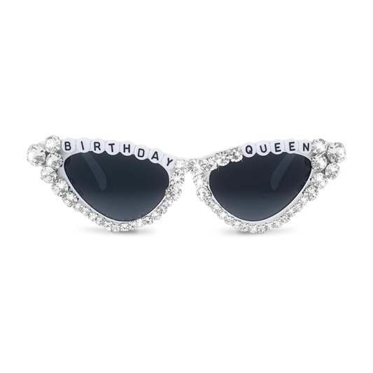 Sunglasses with 'Birthday Queen' text and rhinestone embellishments on a white background